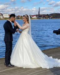 A-Line Sweetheart Wedding Dress with Long Sleeves and Lace Appliques