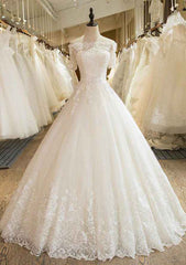 Appliqued Lace Off-The-Shoulder Short Sleeve Ball Gown Wedding Dress with Long Tulle Skirt