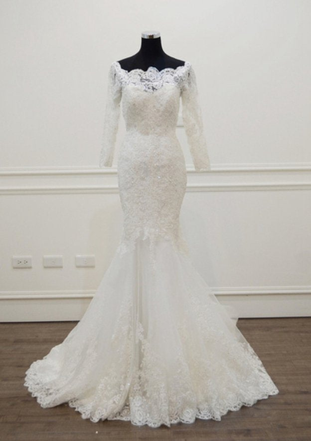 Appliqu¨¦d Beading Off-The-Shoulder 3/4 Sleeve Trumpet/Mermaid Wedding Dress with Chapel Train and Lace Details