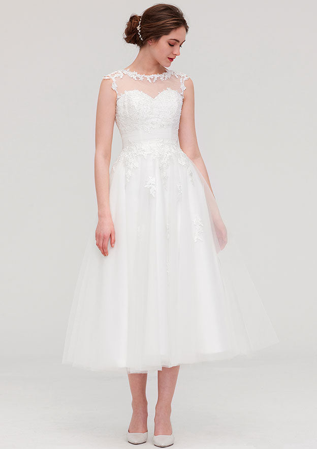 Enchanting A-Line/Princess Tulle Wedding Dress with Illusion Neck, Sleeveless Design, Tea-Length, and Appliqued Beading