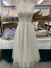 Charming Tulle Wedding Dress with A-Line/Princess Silhouette and Tea-Length Design with Appliqued Details